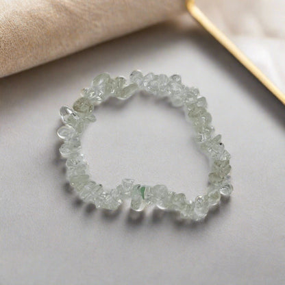 A Clear Quartz crystal chip bracelet. The crystal chips are different sizes.