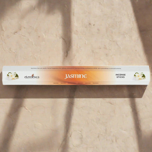 A orange and white cardboard pack of 20 Jasmine fragrance scent incense sticks by Elements.