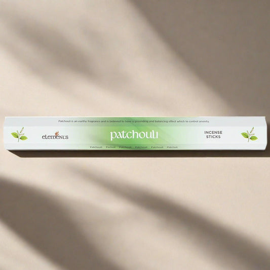 A green and white cardboard pack of 20 Patchouli fragrance scent incense sticks by Elements.