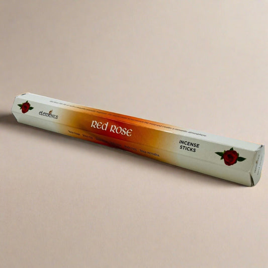 A yellow and red cardboard pack of 20 Red Rose fragrance scent incense sticks by Elements.