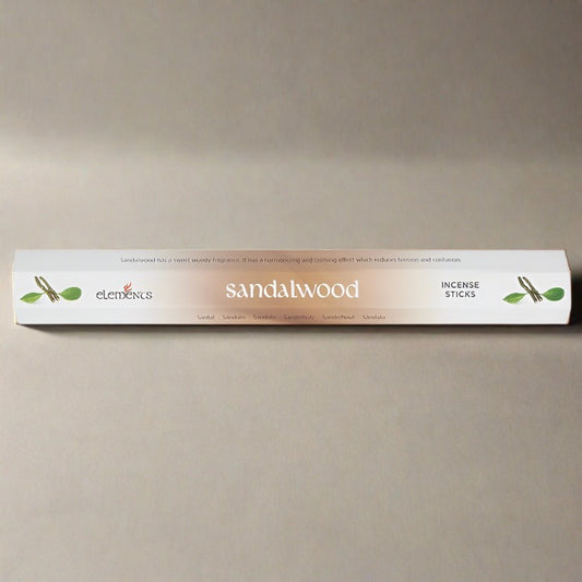 A light brown and white cardboard pack of 20 Sandalwood fragrance scent incense sticks by Elements.